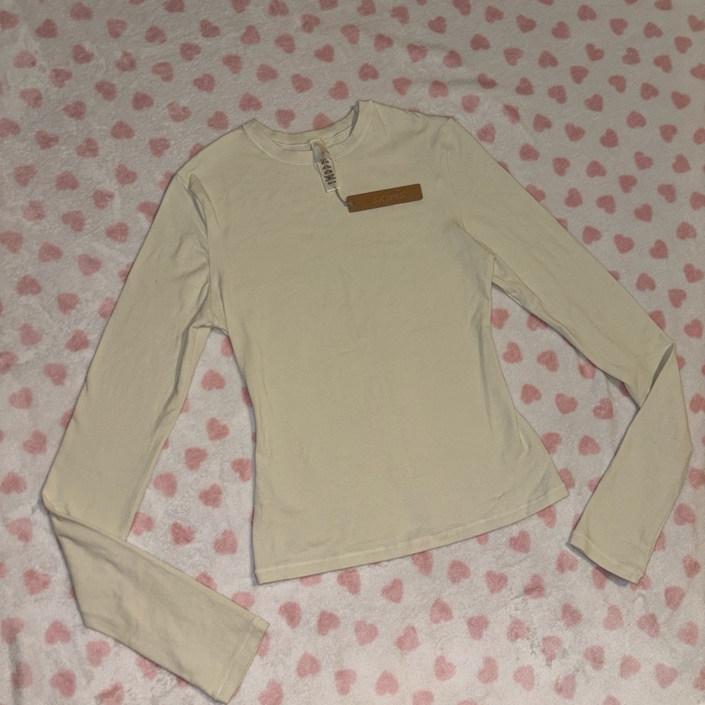Skims cotton jersey long sleeve top bone size small 
New with tag